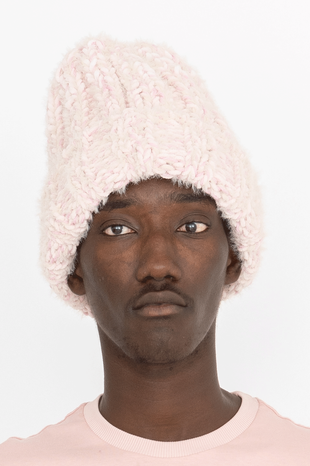 handknitted furry beanie hat pink