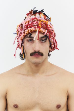 Hand knitted threads beanie hat multi