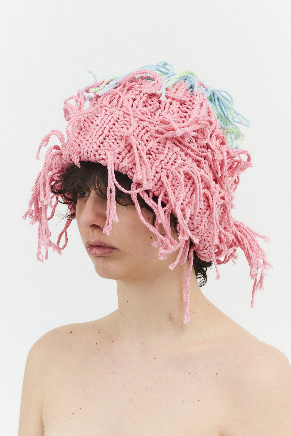 Hand knitted threads beanie hat pink/multi